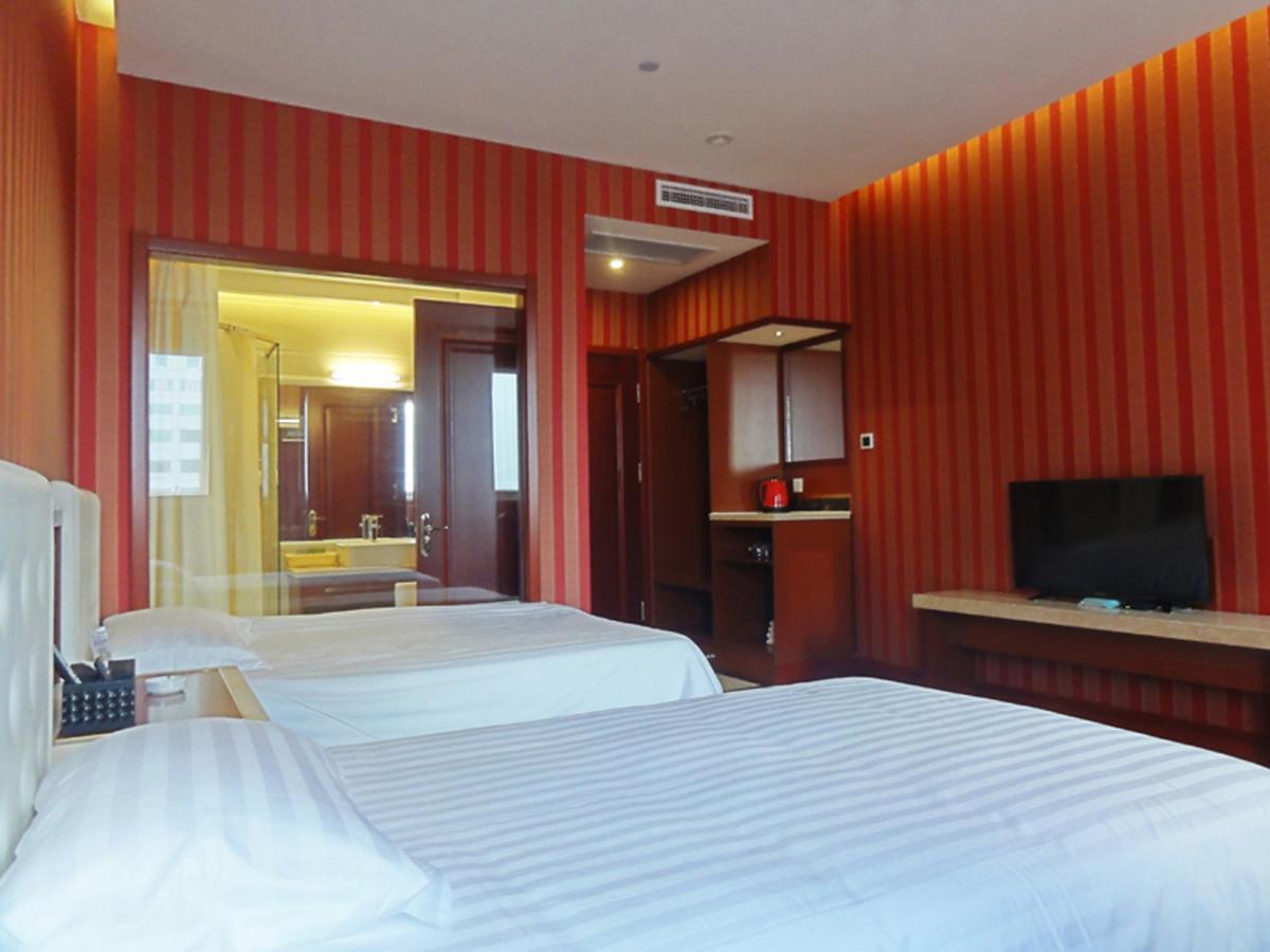 Hua Qi Kaiserdom Hotel Zhongshan Road St Michael'S Cathedral And Zhanqiao Pier Qingdao Exterior foto