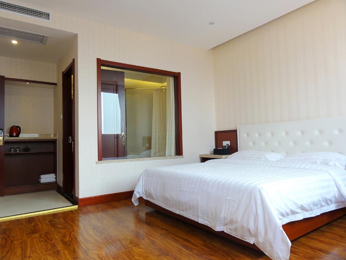 Hua Qi Kaiserdom Hotel Zhongshan Road St Michael'S Cathedral And Zhanqiao Pier Qingdao Exterior foto